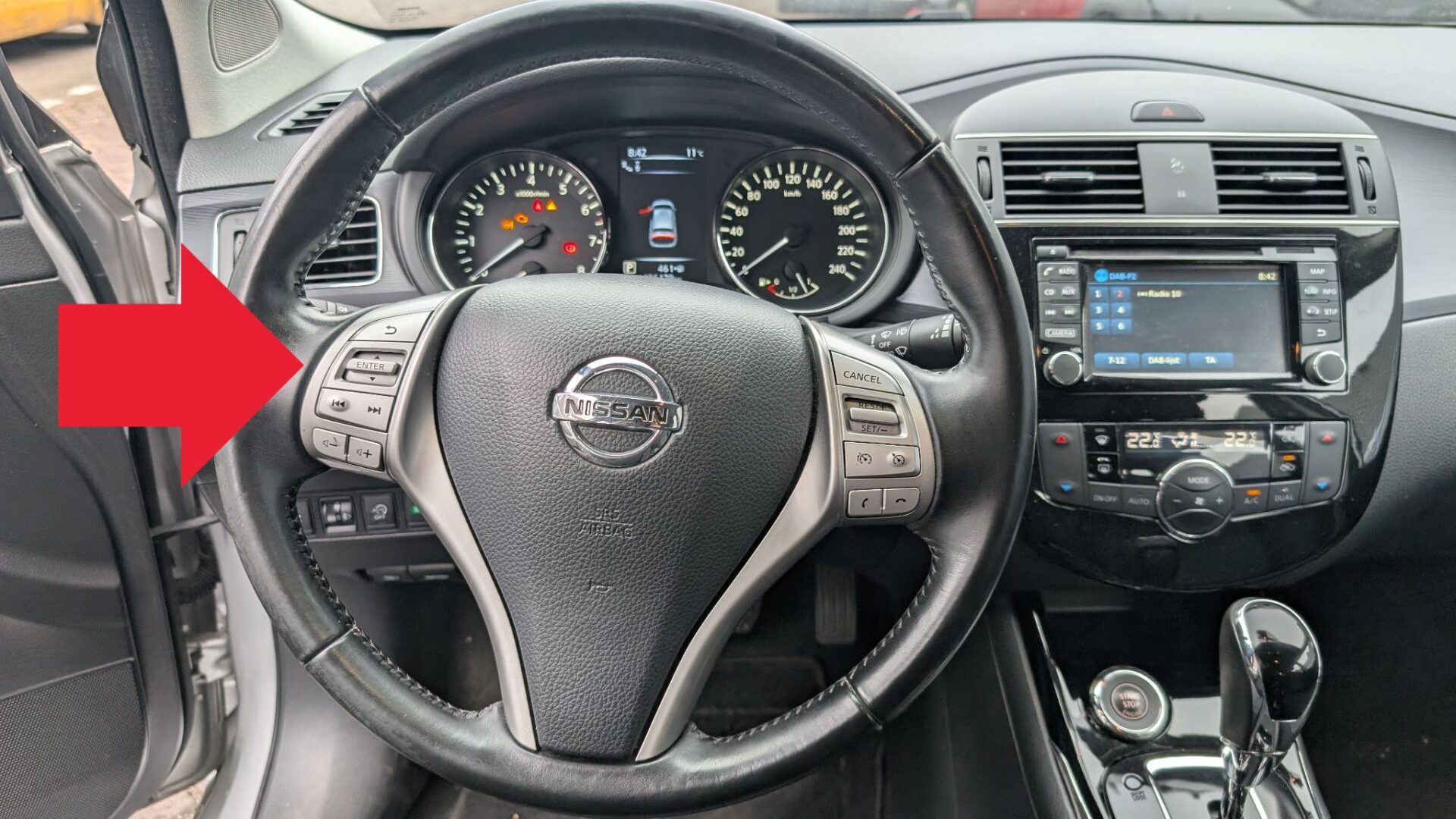 Nissan Pulsar steering wheel display control button