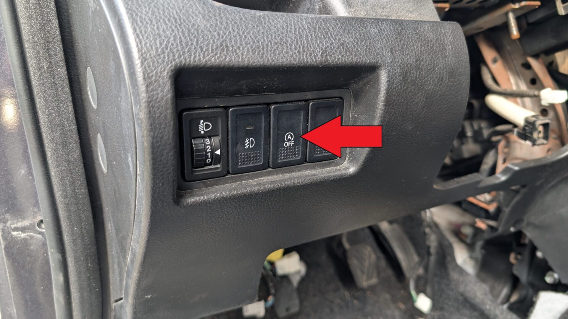 Suzuki Swift Start/Stop A-OFF button on the dashboard
