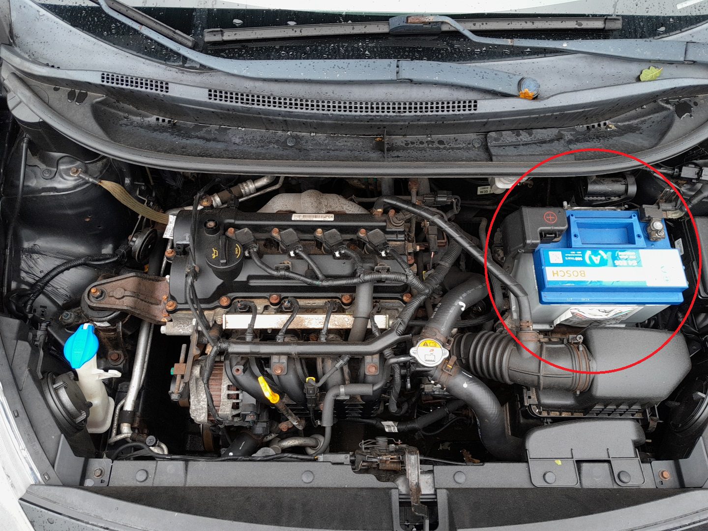 Kia Rio 2011–2018 battery location in engine bay