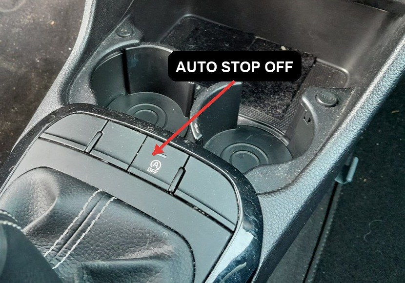 Idle Stop and Go Auto Stop OFF button on the Kia Picanto centre console