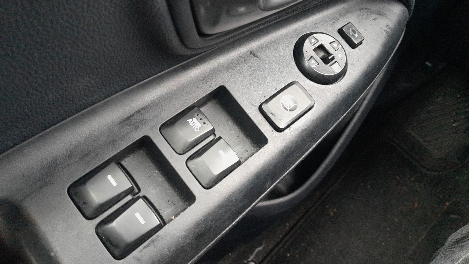 Kia Rio UB driver door window switch panel with the AUTO one-touch switch