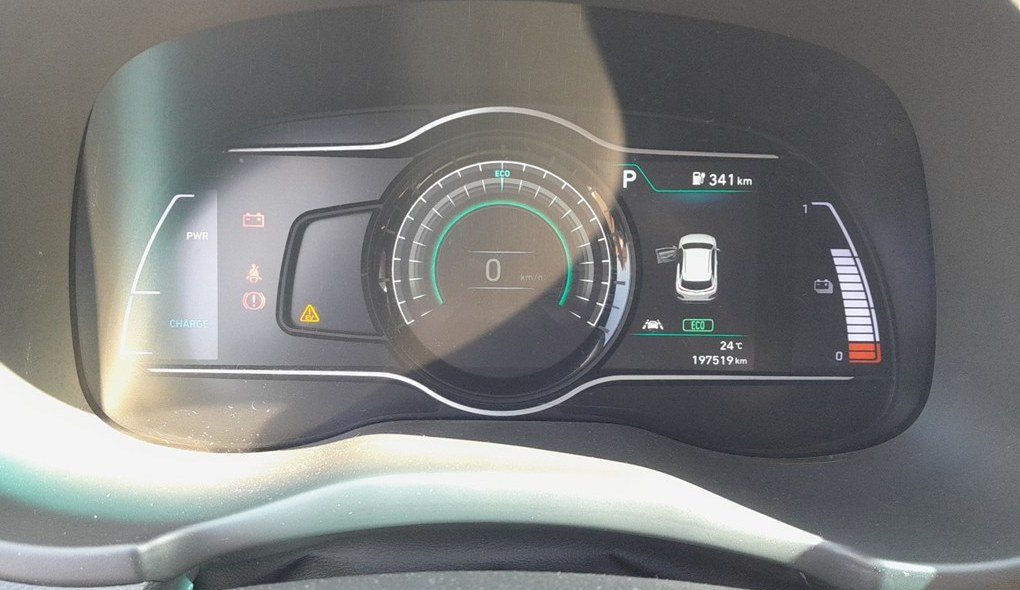 Hyundai Kona Electric digital instrument cluster where the service reminder is displayed