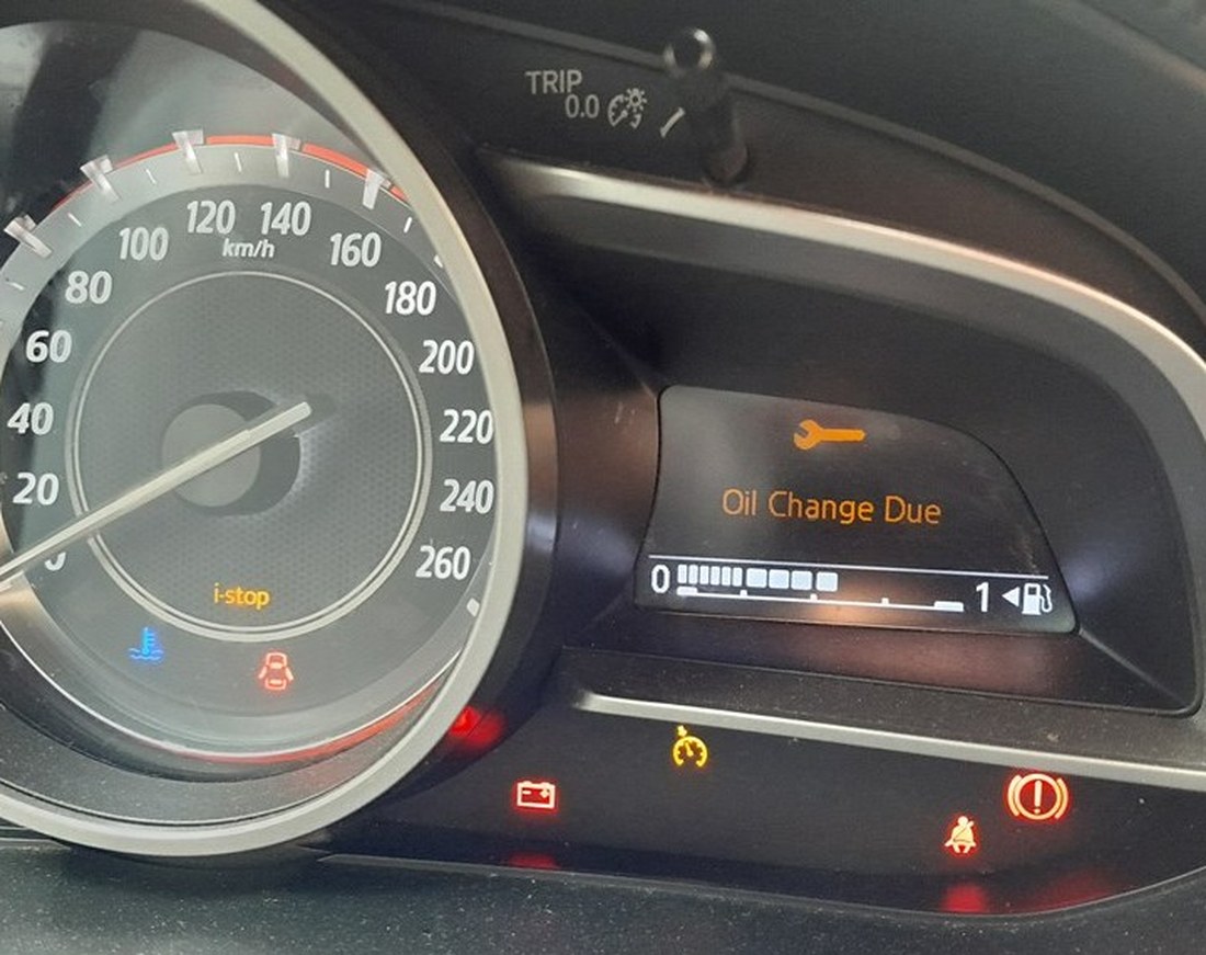 Mazda 3 (BM) instrument cluster showing the Oil Change Due message