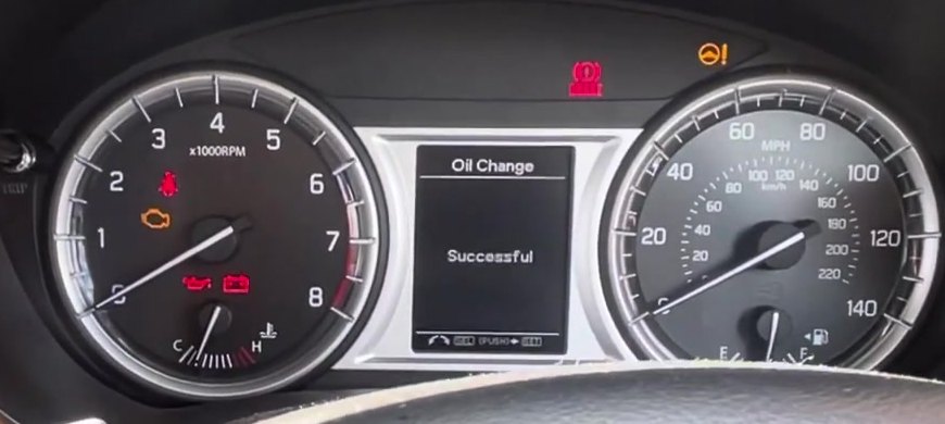 Suzuki Vitara LY instrument cluster showing Oil Change - Successful after a service reset
