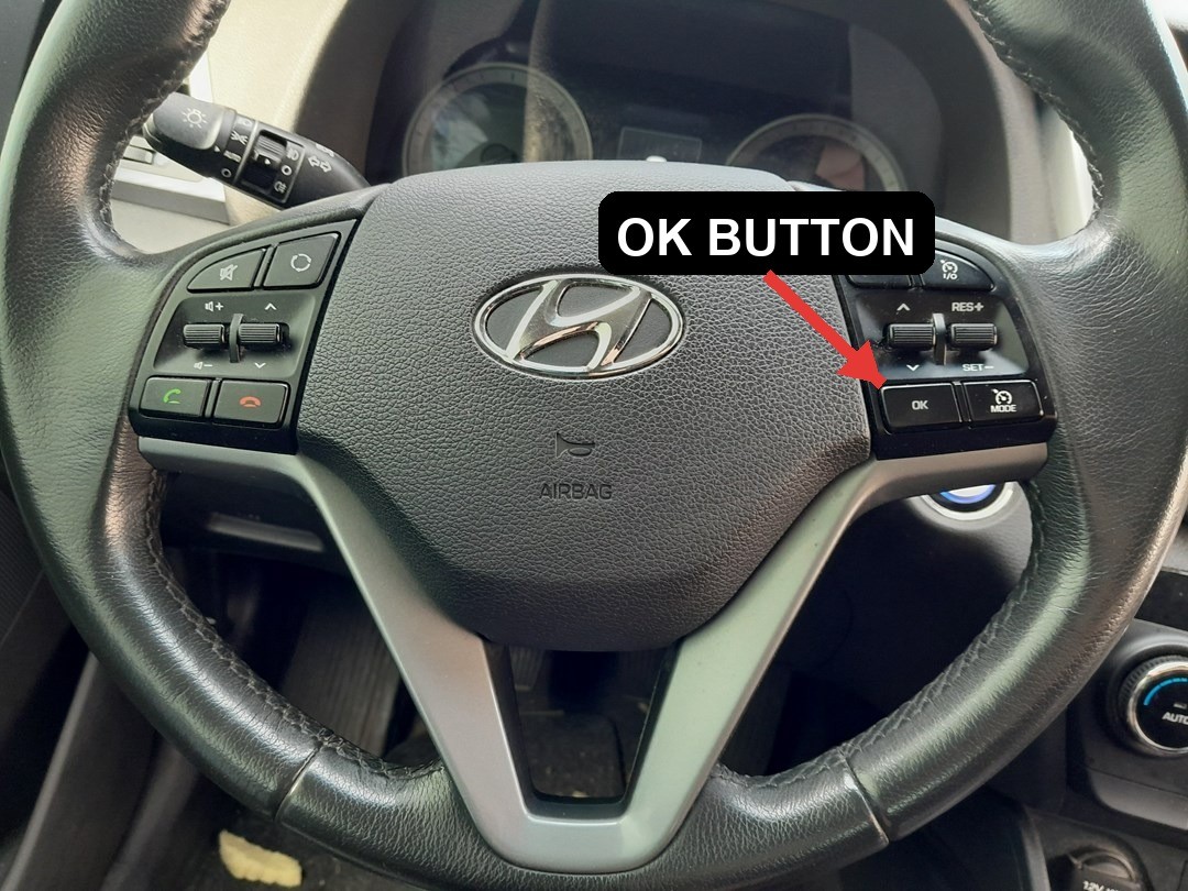 Hyundai Tucson TL steering-wheel OK button used for the service reset