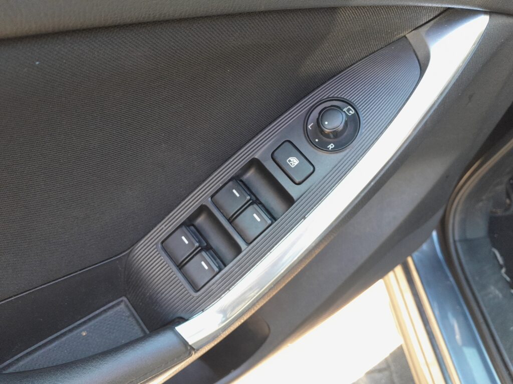 Mazda CX-5 Mk1 driver's door window switch panel.