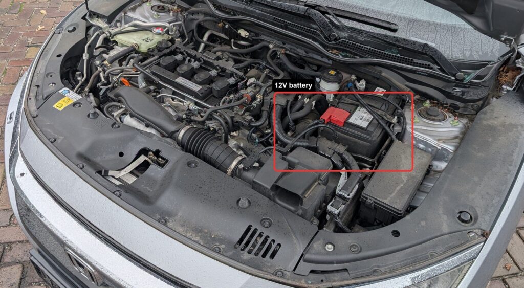 12V battery location in the Honda Civic Mk10 engine bay
