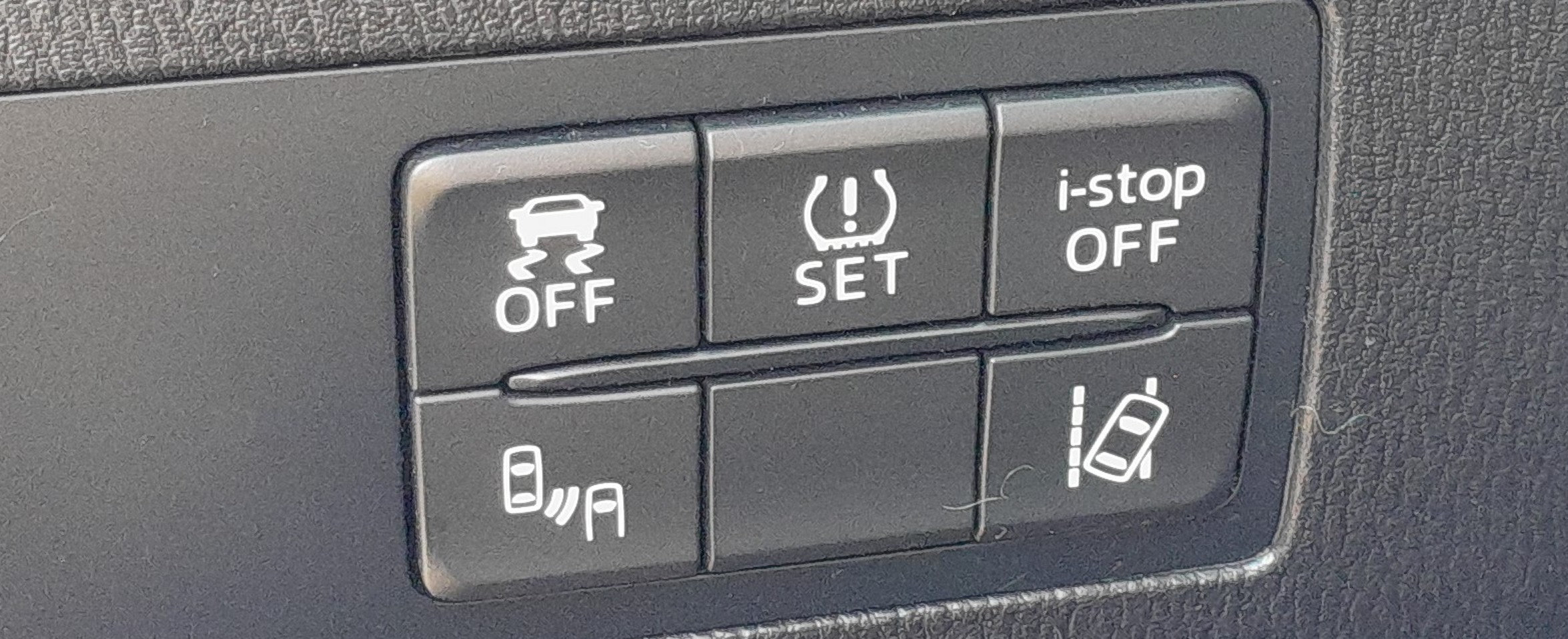 Mazda 2 DJ dash switch panel with the i-stop OFF button