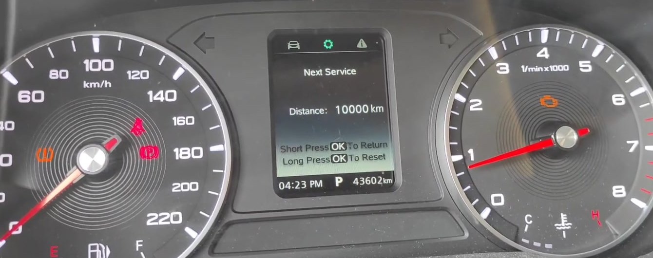 MG ZS instrument cluster showing the Next Service reset menu