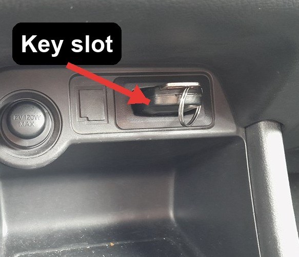 Console key slot for starting a Mitsubishi Outlander with a dead key fob