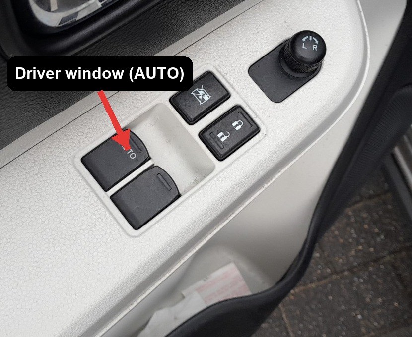 Driver door power-window switches on the Suzuki Ignis