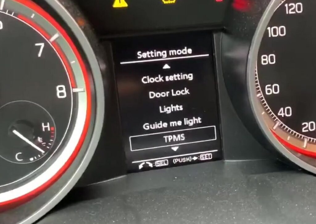 Suzuki Swift Mk4 instrument display showing the Setting mode menu with TPMS selected.