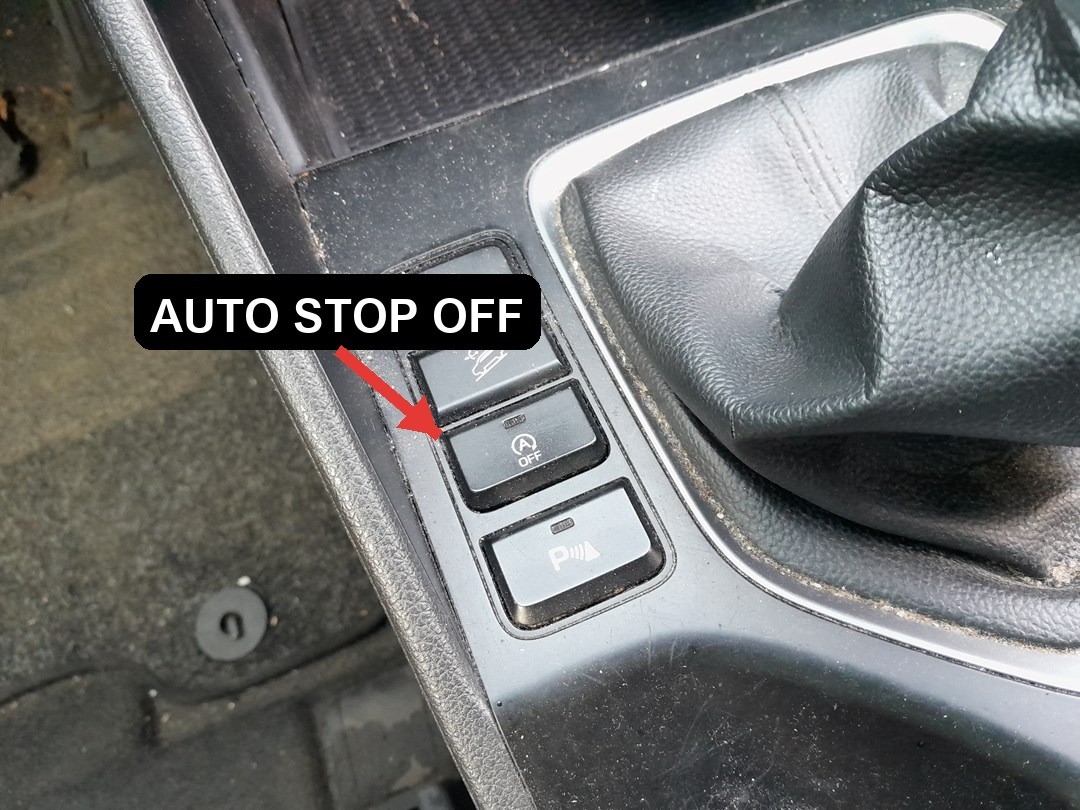 Hyundai Tucson TL Auto Stop ISG OFF button on the center console