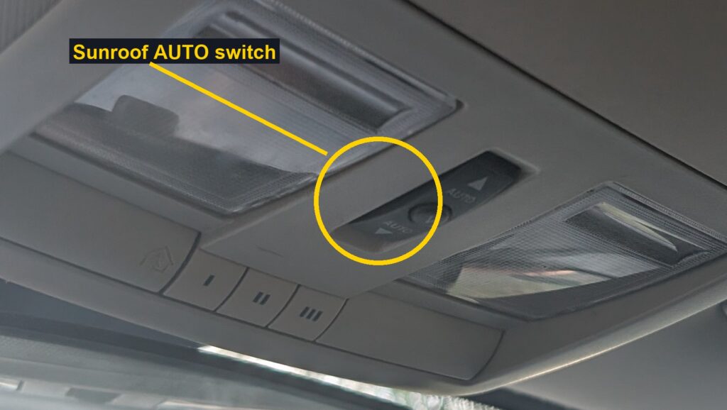 Overhead console sunroof AUTO rocker switch on a Dodge Charger SRT8