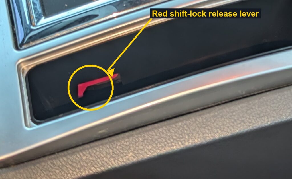 LX-platform emergency park release shift-lock release lever
