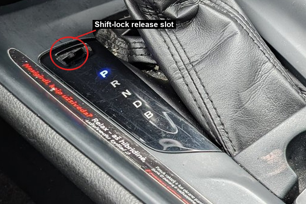 Toyota C-HR CVT gear selector with the shift-lock release slot circled above the P position