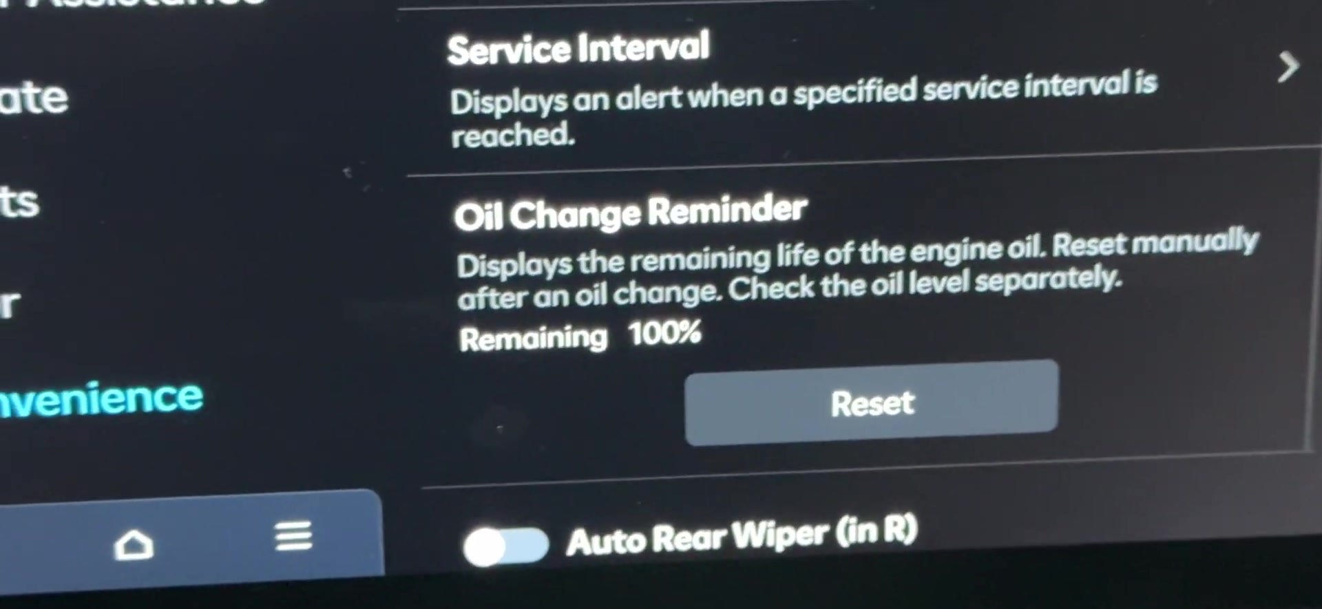 Hyundai Kona SX2 Oil Change Reminder screen with the Reset button (US-market car shown)