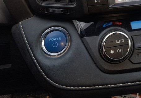 Blue POWER start button on the Toyota RAV4 Mk4 (XA40)
