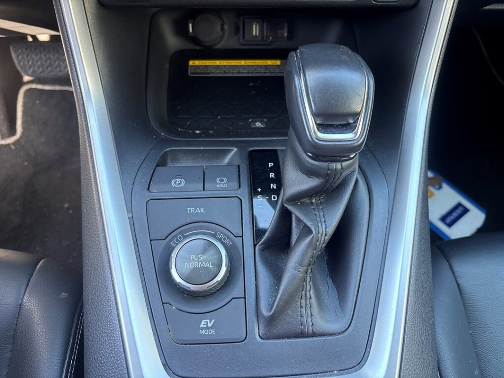 Electronic parking brake and drive-mode controls on the Toyota RAV4 Mk5 (XA50) console