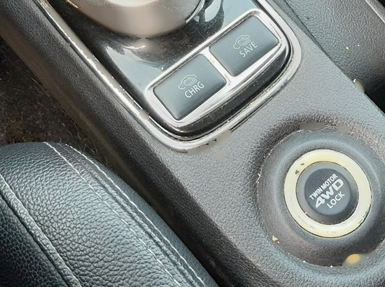 Mitsubishi Outlander PHEV CHRG, SAVE and Twin Motor 4WD-LOCK console controls