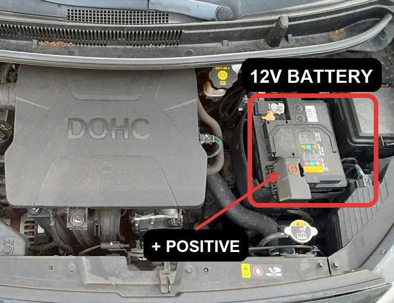 12V battery and positive terminal in the Kia Picanto engine bay