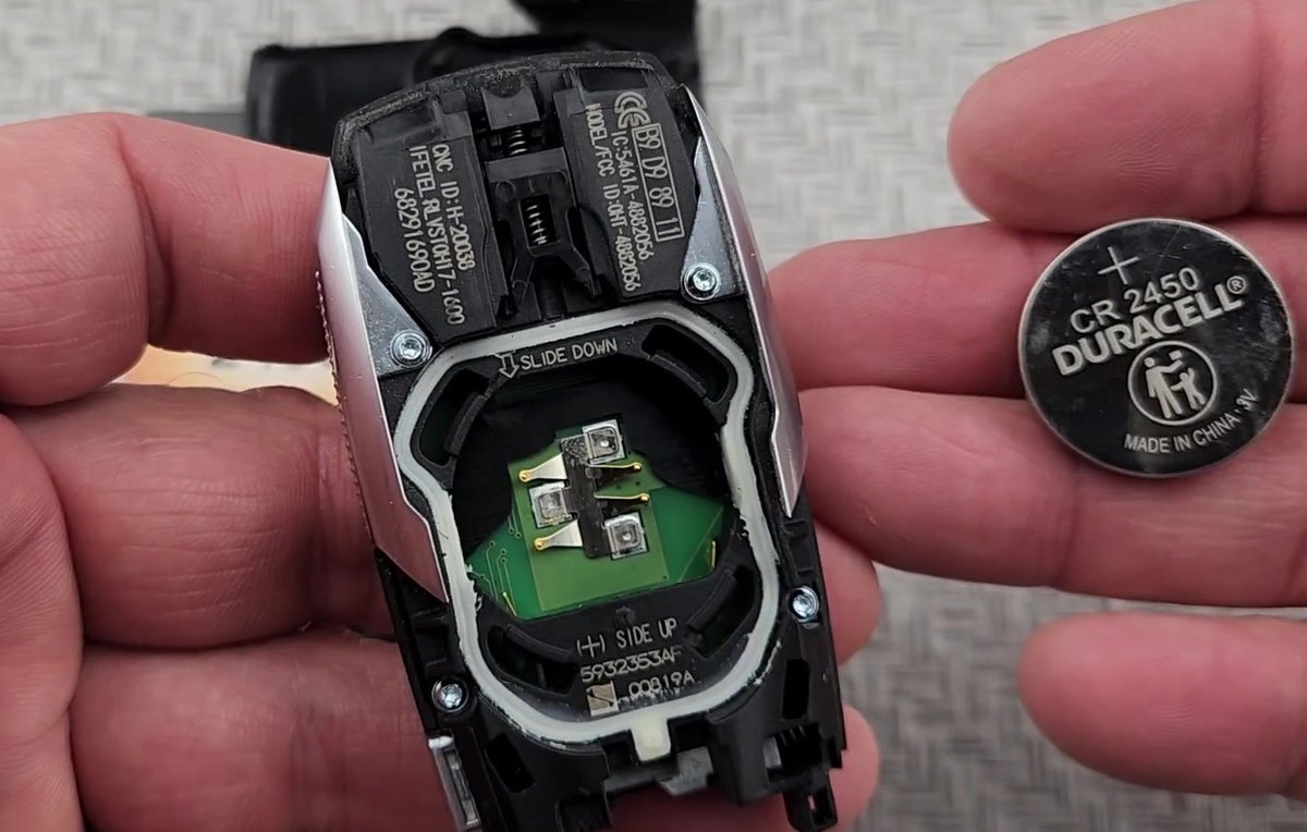 RAM 1500 smart key opened at the battery bay with the CR2450 coin cell lifted out
