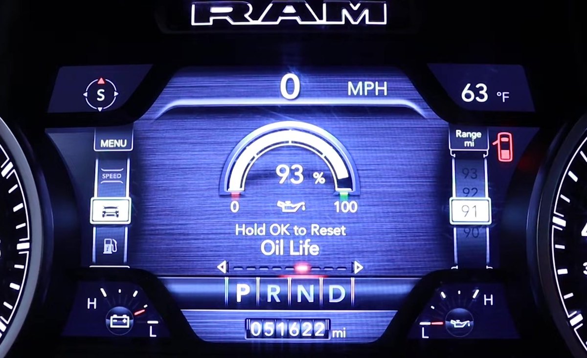 RAM 1500 DT instrument cluster showing the Oil Life gauge at 93 percent with the Hold OK to Reset Oil Life prompt