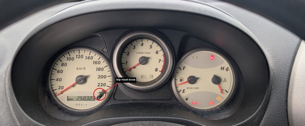 Toyota RAV4 XA20 instrument cluster with the trip-reset knob