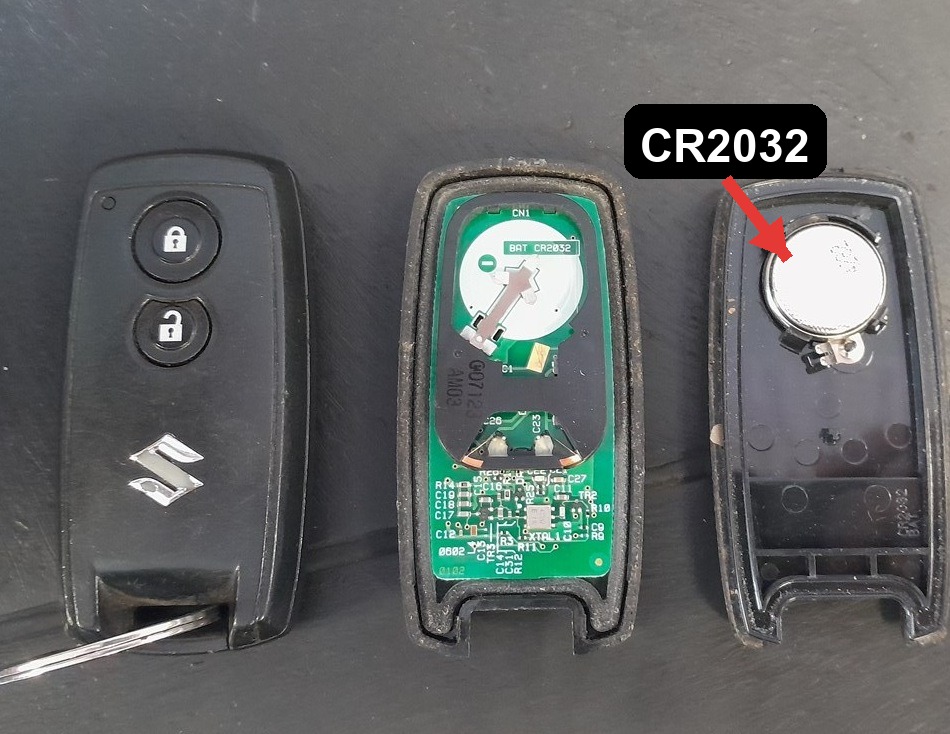 Suzuki SX4 keyless remote opened showing the CR2032 coin cell