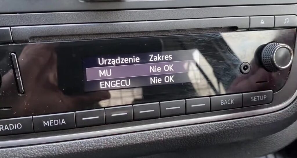Composition radio module-status screen listing MU and ENGECU as Nie OK
