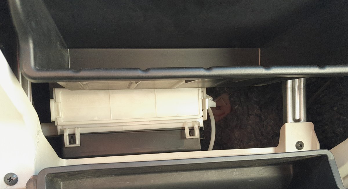 Suzuki Ignis cabin filter housing behind the dropped-down glovebox