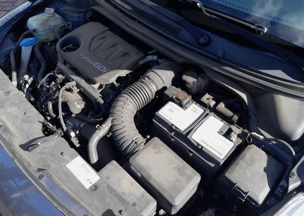 Hyundai i20 1.0 T-GDI engine bay with the 12 V battery