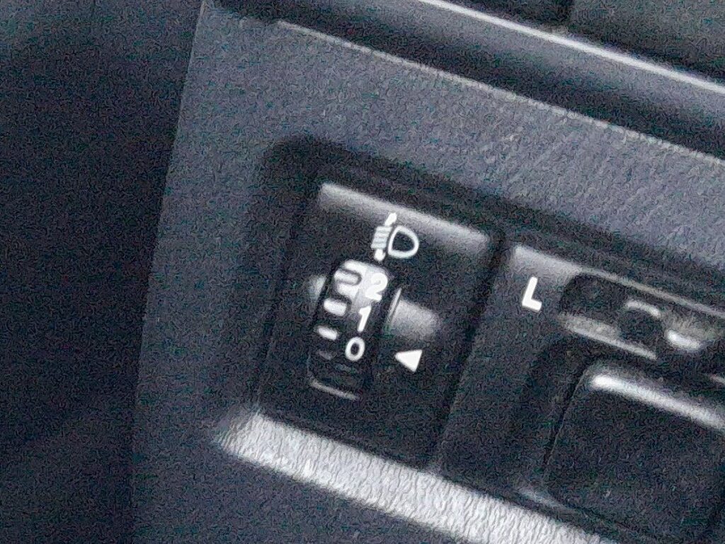 Headlight leveling dial on a Suzuki Jimny, numbered 0 to 3