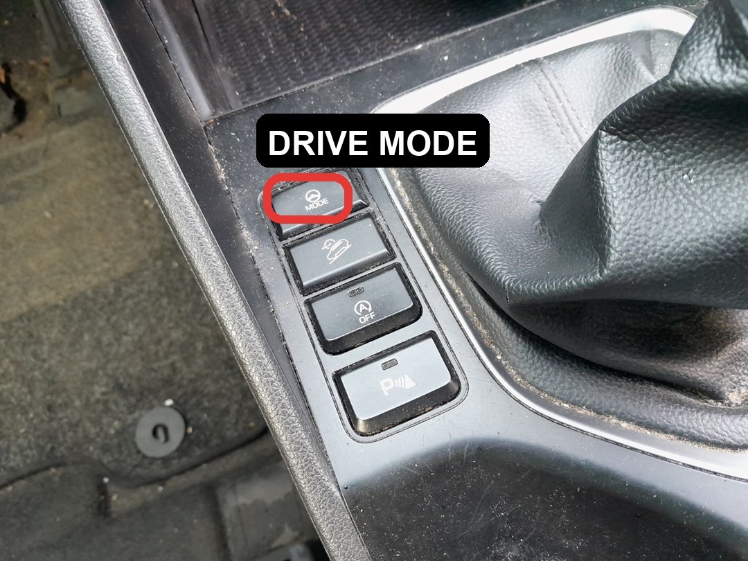 Hyundai Tucson TL Drive Mode MODE button on the center console