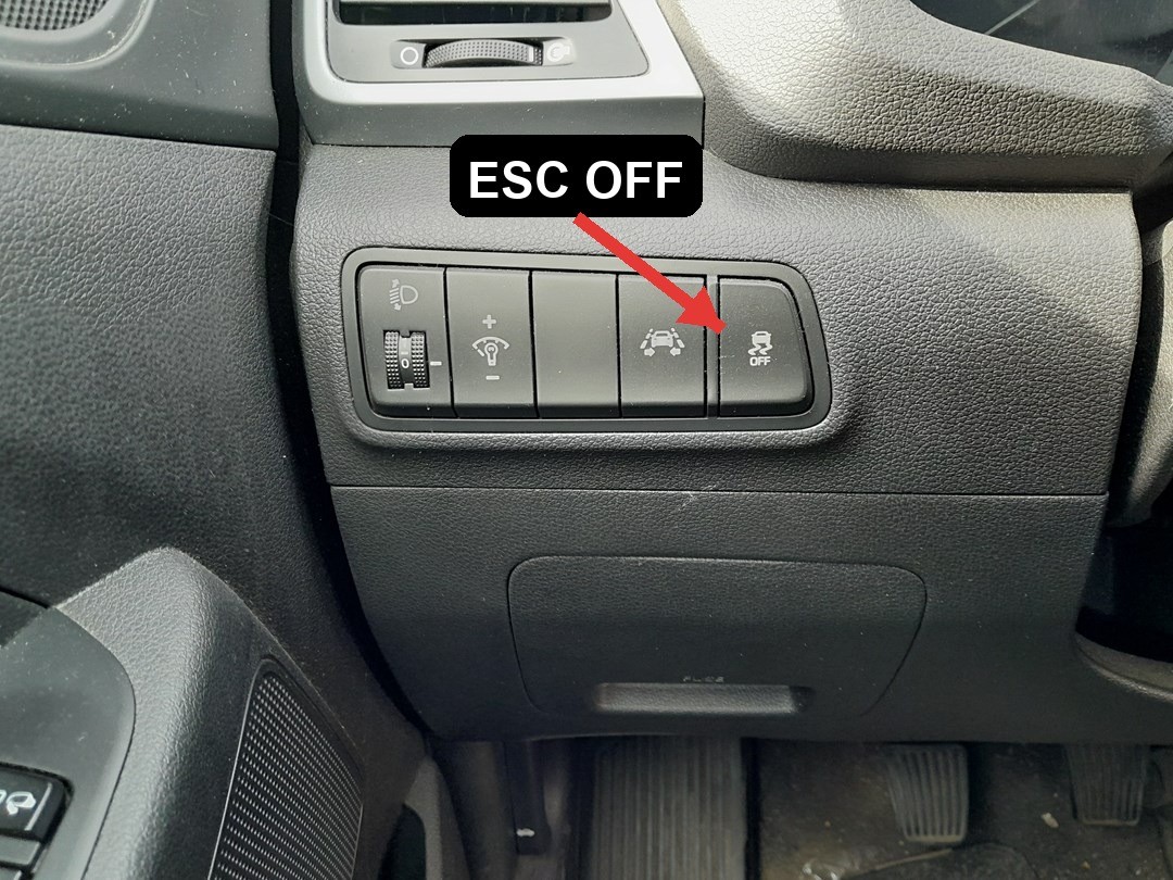 Hyundai Tucson TL ESC OFF button left of the steering wheel
