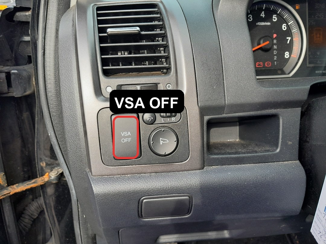 Honda CR-V VSA OFF button location marked