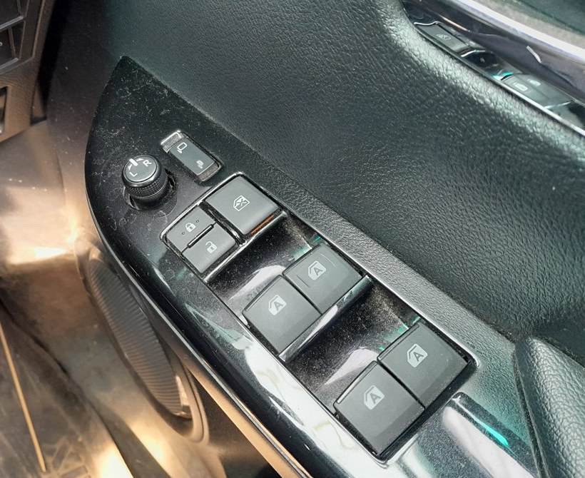 Toyota Hilux driver door one-touch power window switches